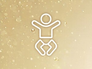 Valkoinen vauvakuvake kimaltelevalla kultatäpläisellä taustalla